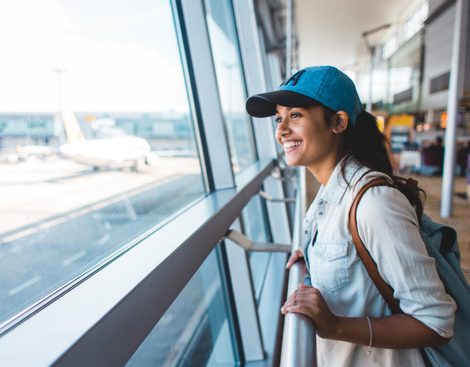 woman happy at airport