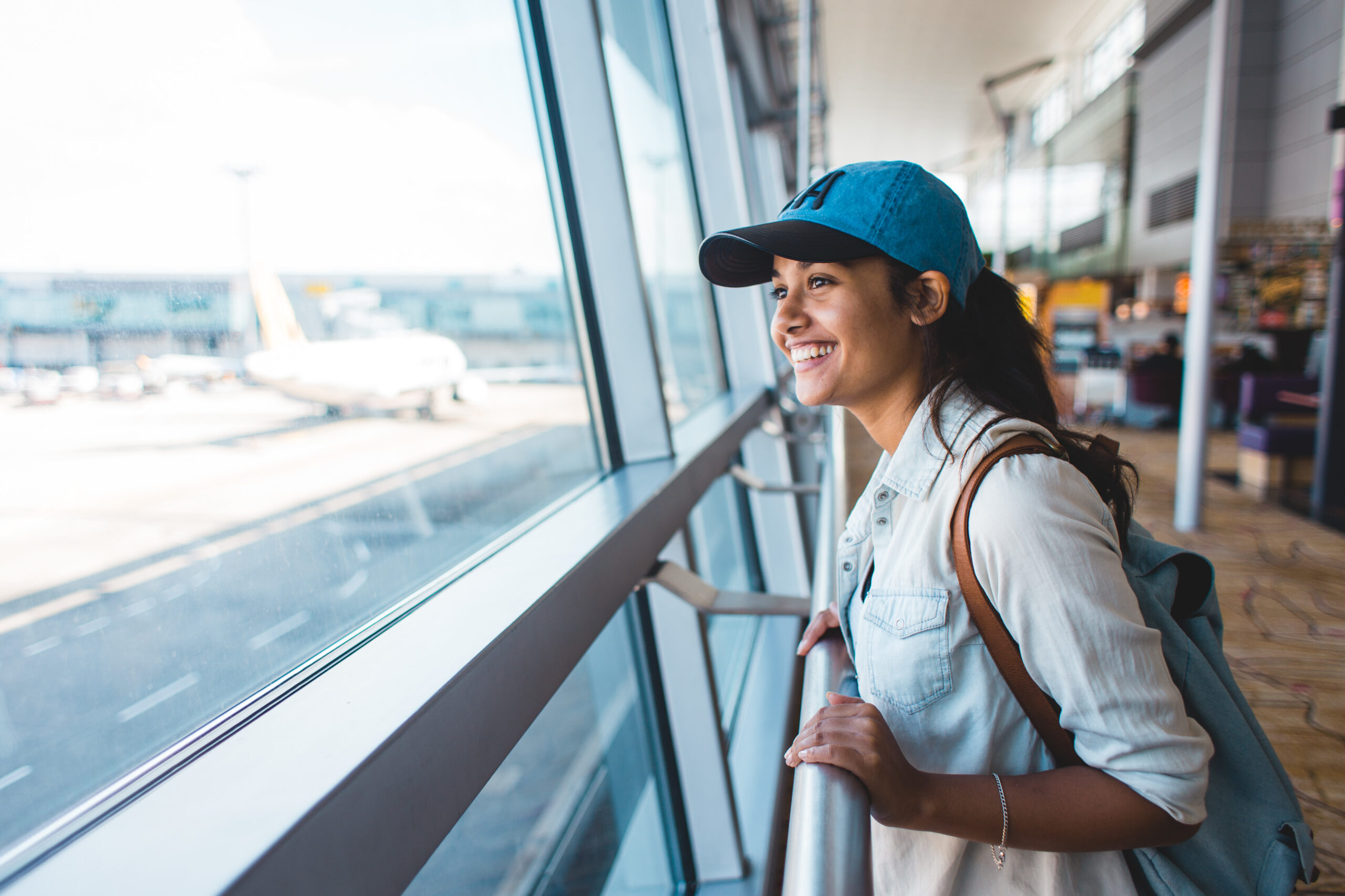 woman happy at airport