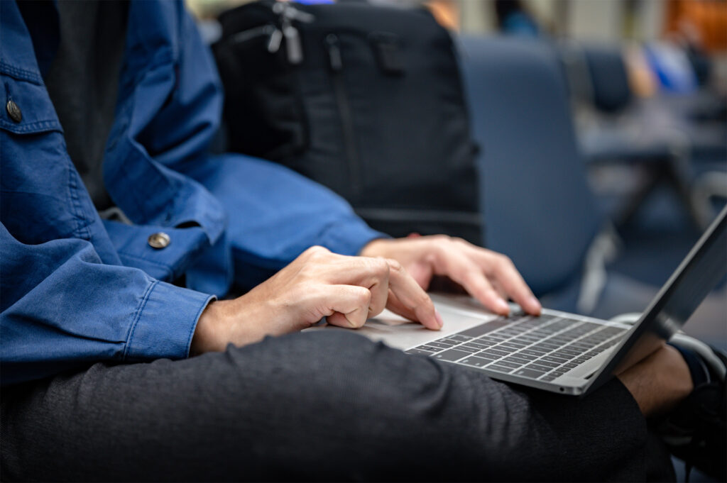 business man using mapvx on his laptop