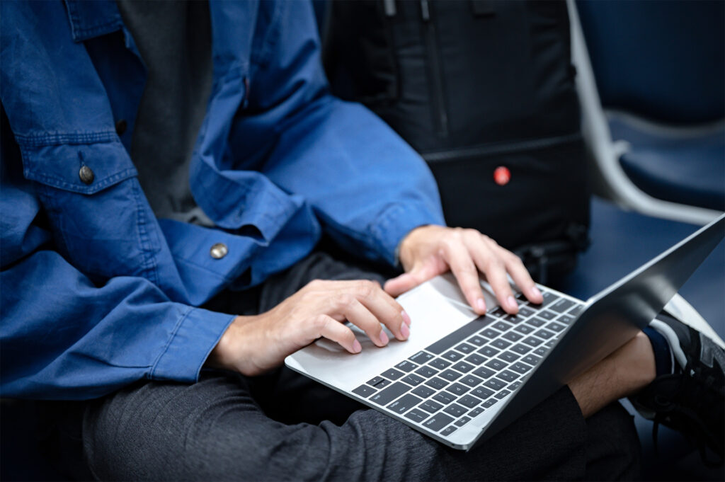 business man using mapvx on his laptop