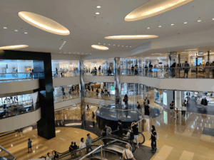 a photo of a mall with a digital directory